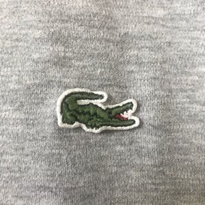 Lacoste size 7 (Large?) T-shirt.